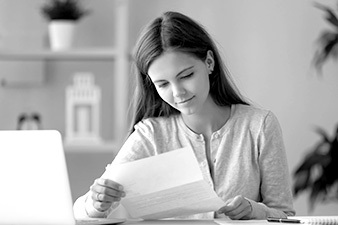 woman holding a letter